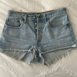 Levi’s 501 high waisted button up cut off shorts